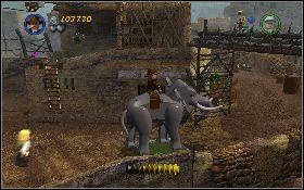 Zeskocz na dół, wejdź do zagrody słonia i odkop zielono-czerwone klocki [1] - Małpie psoty | Świątynia Zagłady | LEGO Indiana Jones 2 - LEGO Indiana Jones 2: The Adventure Continues - poradnik do gry