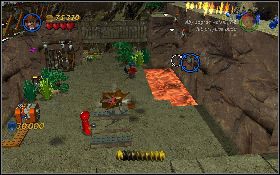 Podnieś łopatę, wykop metalowy klocek [1] , zniszcz go bazooką, podnieś włócznię i rzuć nią w jeden z punktów na ścianie [2] z prawej - Górska jaskinia (bonus) | Świątynia Zagłady | LEGO Indiana Jones 2 - LEGO Indiana Jones 2: The Adventure Continues - poradnik do gry