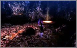 Używamy nowo zdobytego przedmiotu, obok zniszczonego wcześniej mostu [1] - Chapter III: The Burning Ground (2) | Opis przejścia Bayonetta - Bayonetta - poradnik do gry