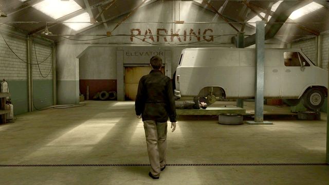 Na parkingu zagadaj z mechanikiem, potem użyj żółtej windy (Elevator) - Niedźwiedź (The Bear) | Opis przejścia Heavy Rain - Heavy Rain - poradnik do gry