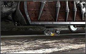 Teraz przyjrzyj się (zbliżenie) podwoziu wagonika (z przodu) - Lunapark - New Jersey (cz. 2) - Opis przejścia - 20.10.2009 - Art of Murder: Karty Przeznaczenia - poradnik do gry