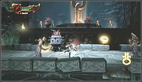 Nieco dalej, pokonując ścieżkę prowadzącą pod górę, natkniesz się na dwie skrzynie ze zdrowiem i maną - Ścieżka Eosa (2) | Opis przejścia God of War III - God of War III - poradnik do gry