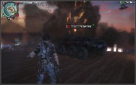 Przejdź na tył podwyższenia, na którym stoi wóz pancerny i złap się hakiem ściany w takim miejscu, żebyś widział karabin maszynowy na wozie, ale żeby nie mógł cię on ostrzelać [1] - Trzej Królowie | Opis przejścia Just Cause 2 - Agencja - Just Cause 2 - poradnik do gry