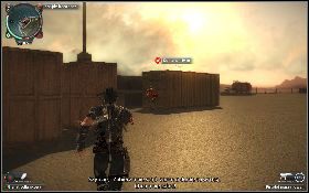 Po wyjściu na brzeg wsiądź w rządowy wóz [1] i podjedź nim w okolice kontenera, w którym przetrzymywany jest więzień - Chcę się wyrwać | Opis przejścia Just Cause 2 - Żniwiarze III - Just Cause 2 - poradnik do gry