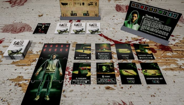 W kolekcjonerce planszówki na podstawie Piły znajdziecie naturalnych rozmiarów uciętą rękę - ilustracja #1