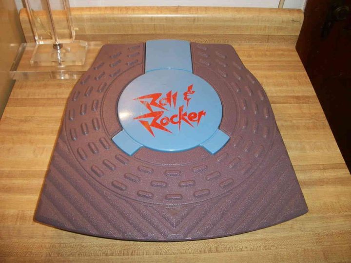 Shield? Cutting board? Dunno why Roll 'n Rocker looked like this, but it did not conquer the market. - 15 Weirdest Game Controllers Ever – Document – 12/06/2021
