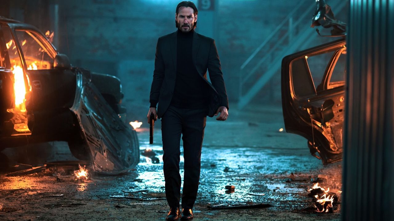10 lat temu zadebiutował John Wick. Ikoniczne widowisko akcji z Keanu Reevesem zmieniło reguły gry i na zawsze zapisało się w historii kina, źródło grafiki: John Wick, Chad Stahelski, Lionsgate, 2014.