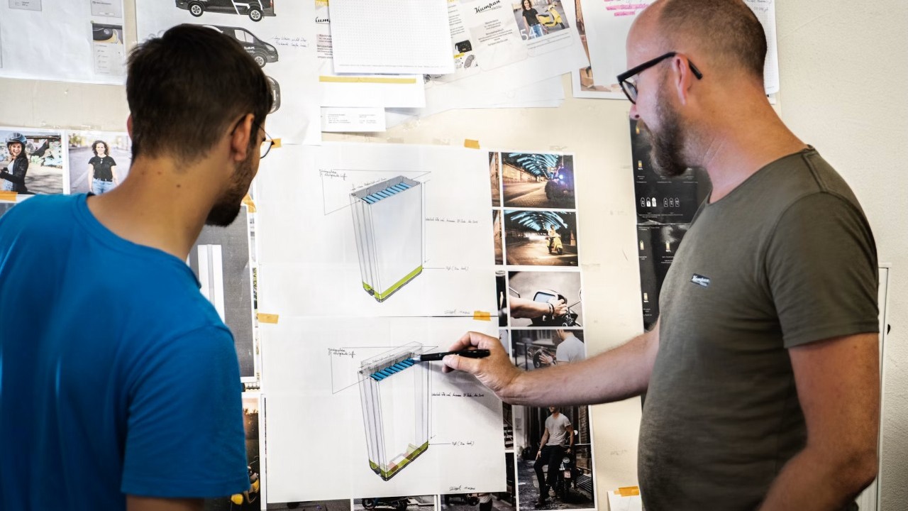 60 tysięcy cykli i ładowanie w 3 minuty. Ta bateria może rozwiązać dwa największe problemy magazynowania energii, źródło grafiki: Kumpan Electric; Unsplash.com; 2020.