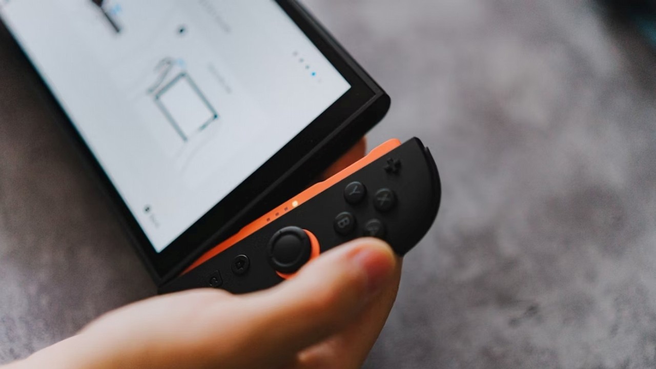 Dog bit off player's JoyCon from Switch 2. Nintendo will replace missing part for free, image source: Kamil Switalski; Unsplash.com; 2025.